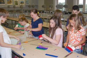 B.R.E.A.K. students working on a craft