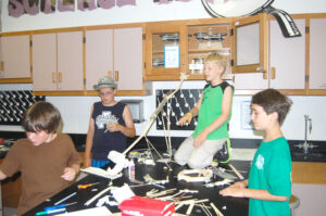 Kids construct a dinosaur