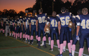 football players sported pink socks