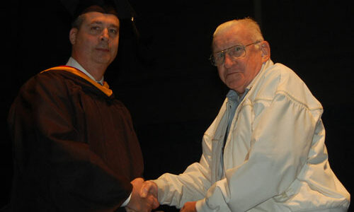 special graduate, Mr. Philip Fisher, a Korean War veteran who received his diploma