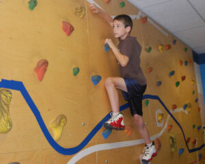 Climbing the rock wall