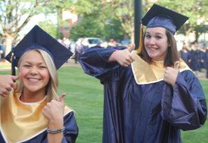 Graduates give the thumbs up