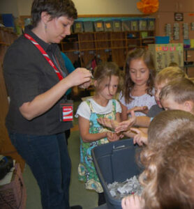 Students learning about composting