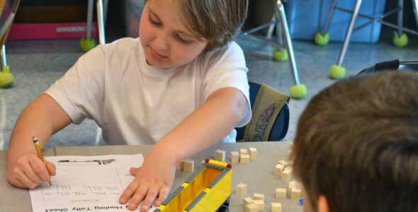 Lessons utilize everyday materials, such as Legos, empty drink containers, meat trays, straws, rubber bands and paper clips that students use to build and test simple machines such as airplanes, rainwater harvesters and birdhouses.