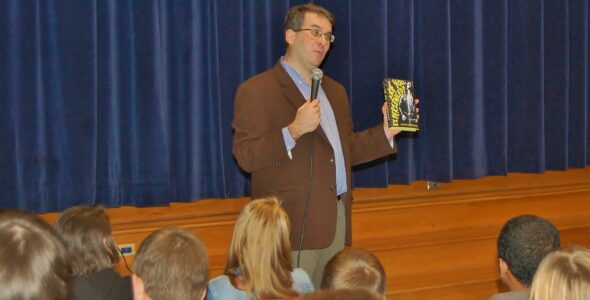 Jordan Sonnenblick holds a copy of his book "Are You Experienced?"