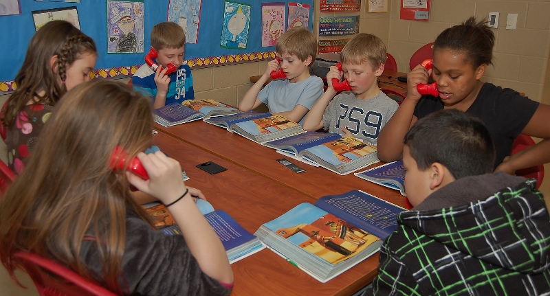 Central Manor practice reading with Whisper Phones