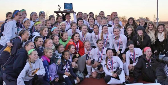 Co-champions Penn Manor and Palmyra pose with the state trophy.