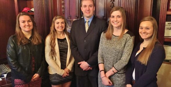 State Rep. Bryan Cutler poses in the House chambers with Penn Manor seniors