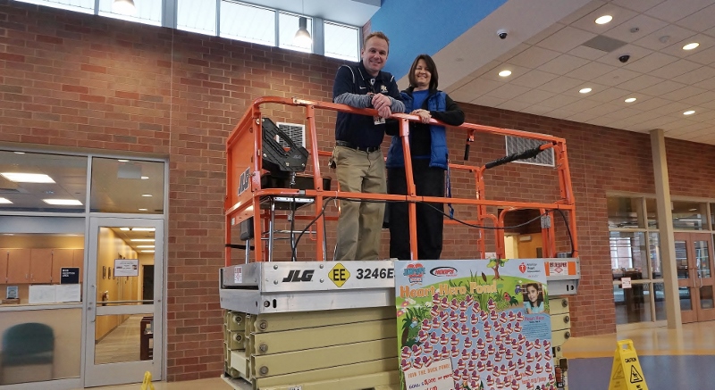 Dr. Jerry Egan and Mary Barnett on a lift