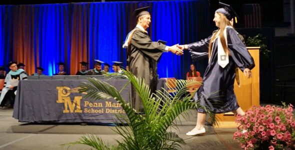 Student receives diploma