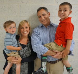 Kim Marsh with her husband, Steve, and sons, Landon, left, and Chase.