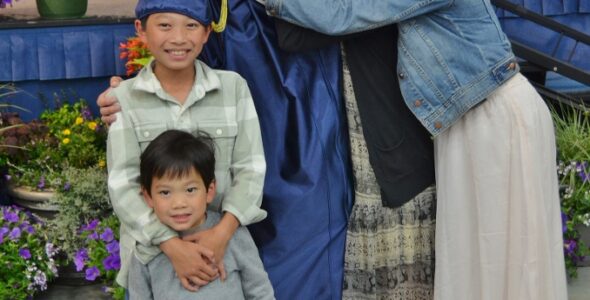 Valedictorian Alan Dang with family