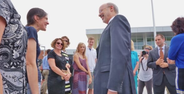 Wolf chatting with teachers