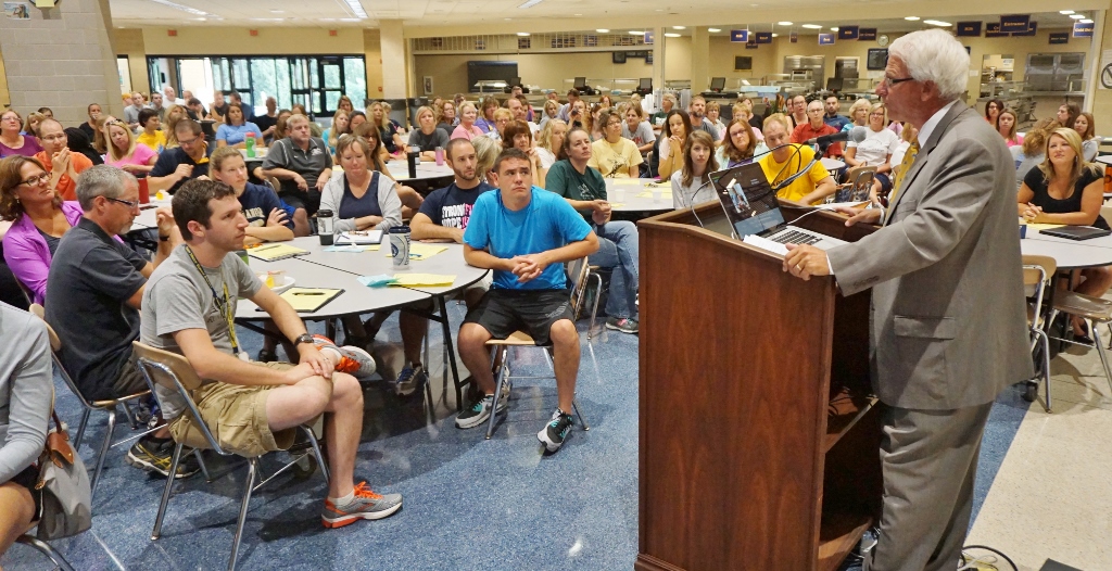 School board president Ken Long addresses the crowd.