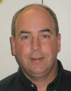 Softball coach Dave Stokes