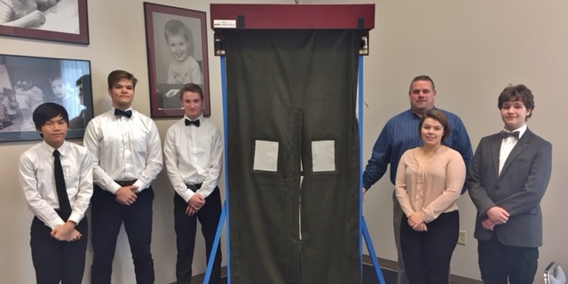 Members of the PMHS STEM team, from left, Kevin Ward, Ryan Mahoney, Cole Yecker, Calle MacDonald, Joshua Adams and teacher Barry Groff pose with the fire barrier prototype.