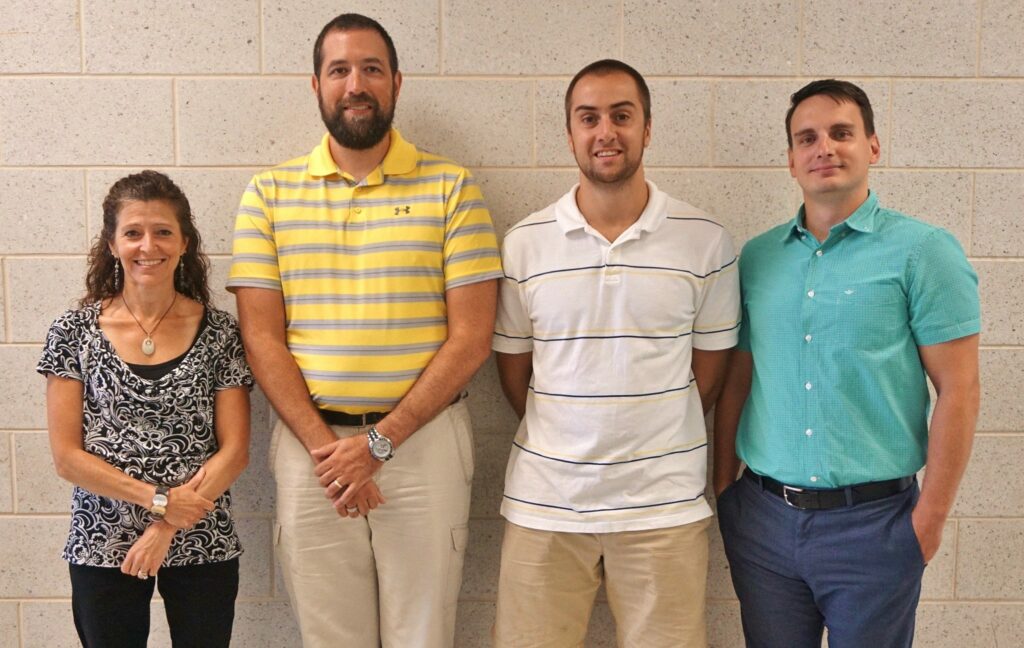 From left, new teachers Vicki Fafel, Joel Ernst, Mitch King and Jeb Thompson.