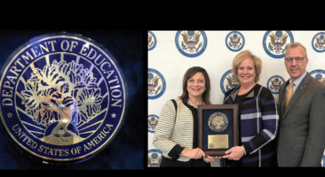 Blue Ribbon plaque and Lisa Suydam, Carly McPherson and Mike Leichliter.