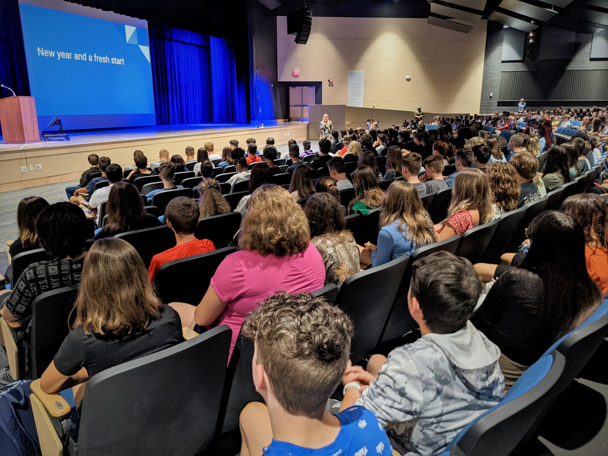 students in high school auditorium