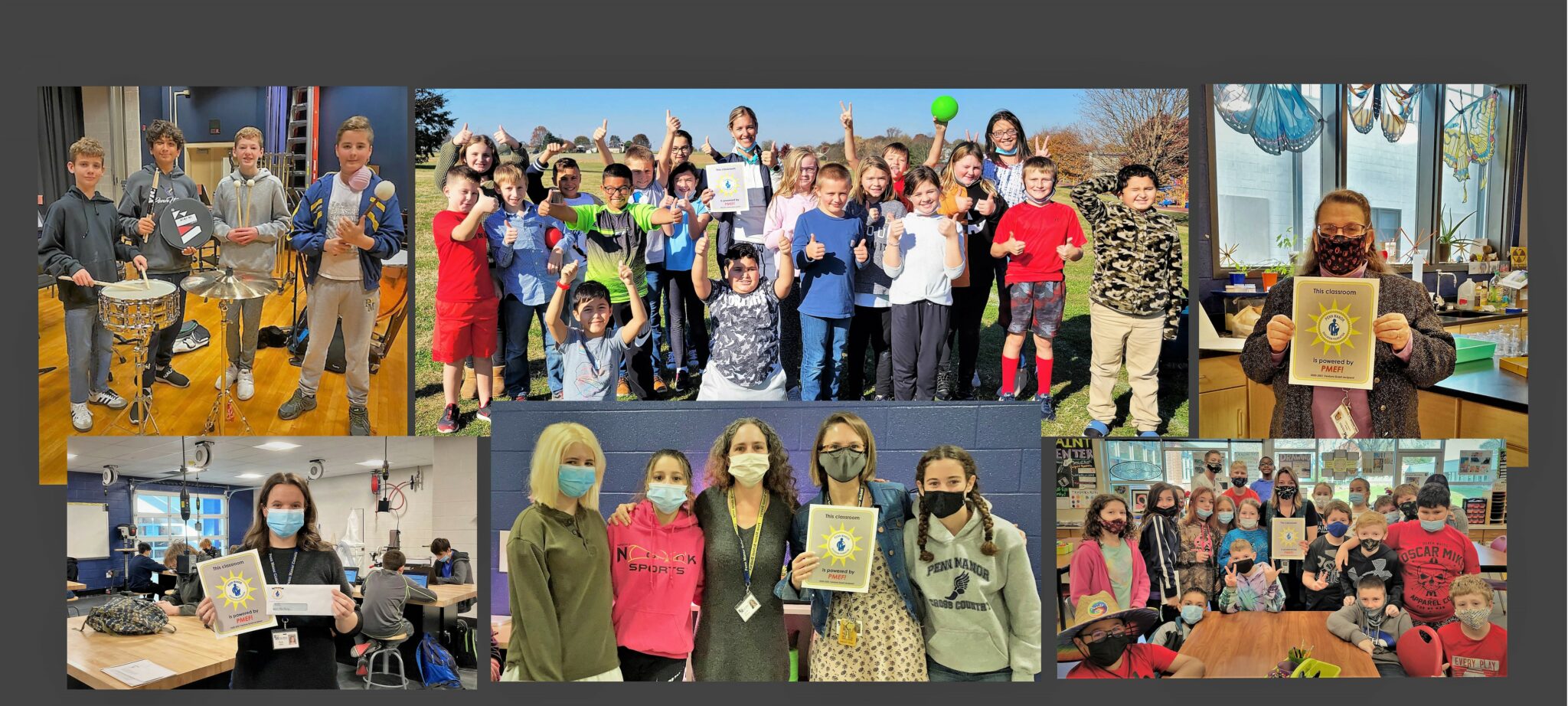 Teachers and students displaying their Venture Grant awards.