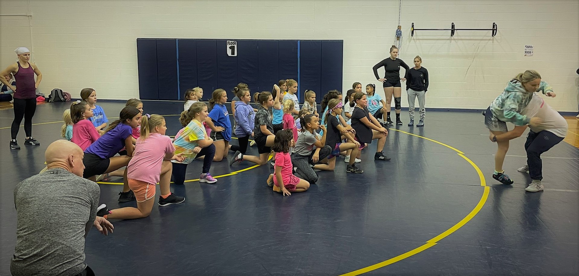 Female wrestlers at practice