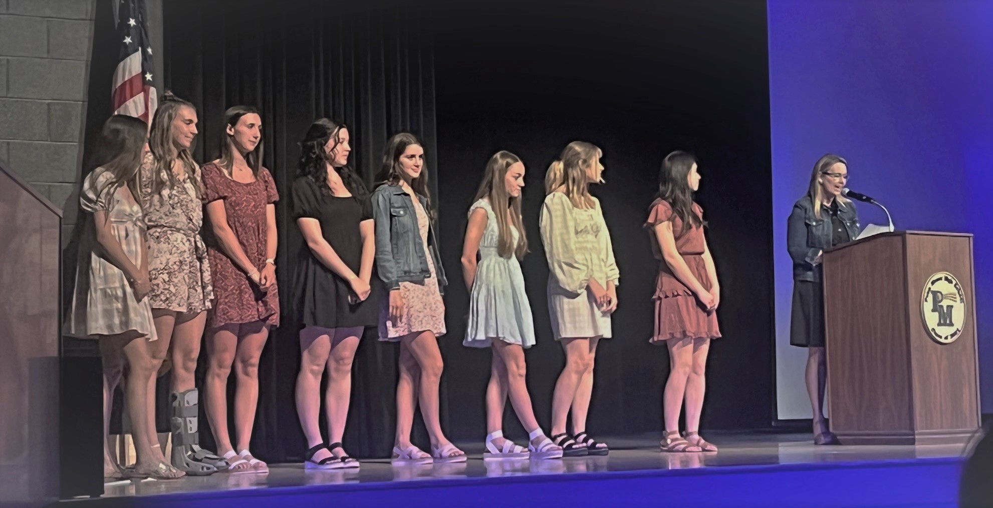 Photo of students onstage to receive scholarship awards