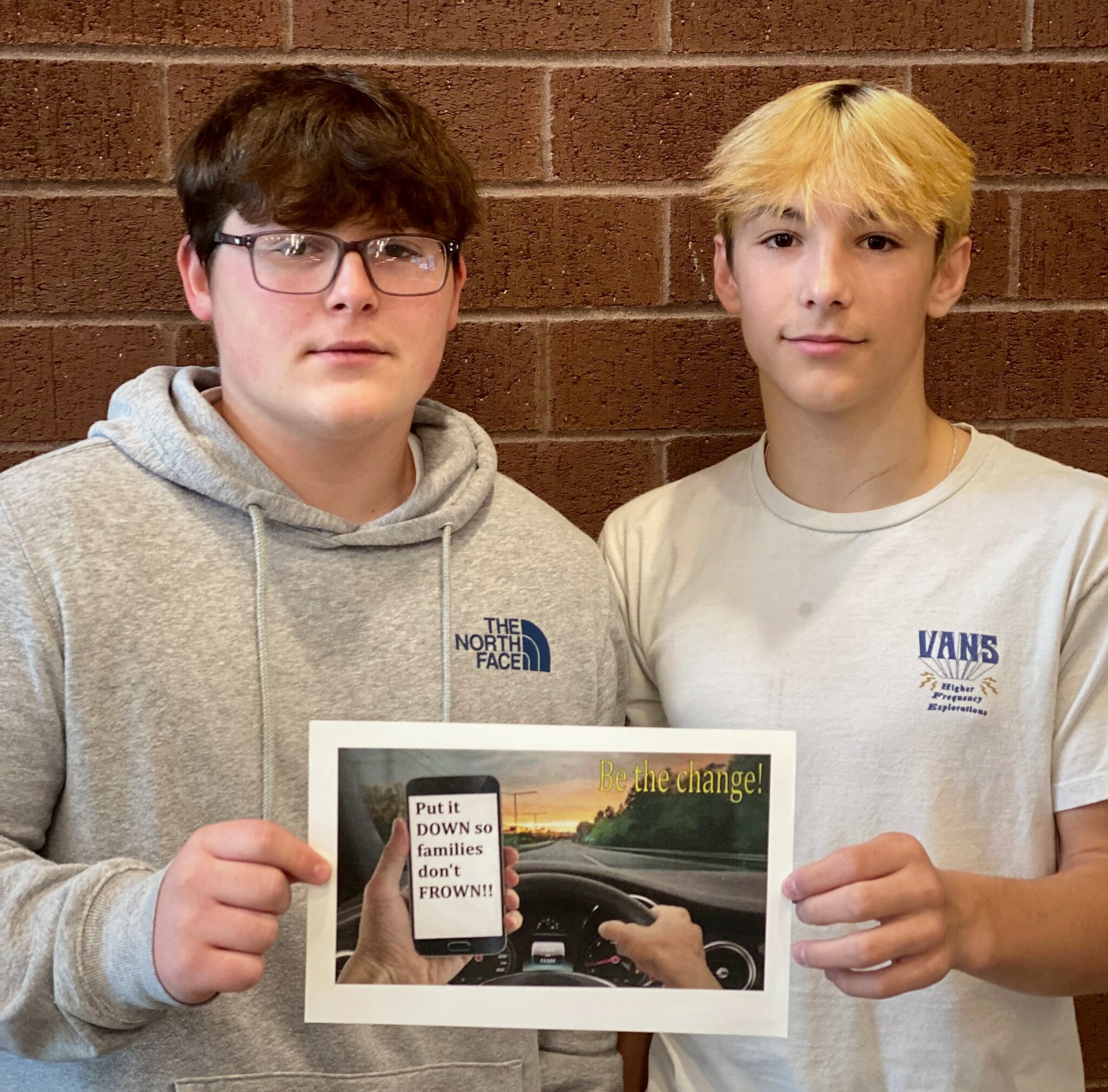 Photo of Kyle Sullenberger and Travis Clawson with their design.