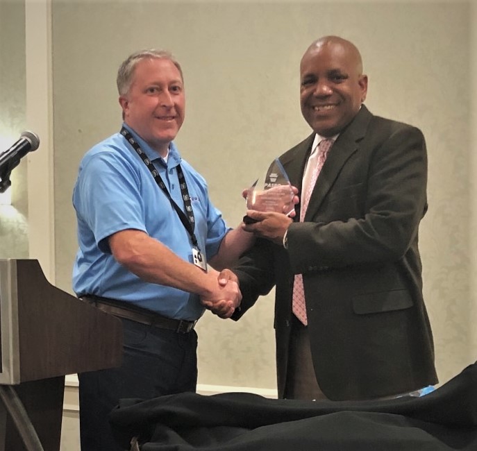 Officer Hottenstein receiving his award