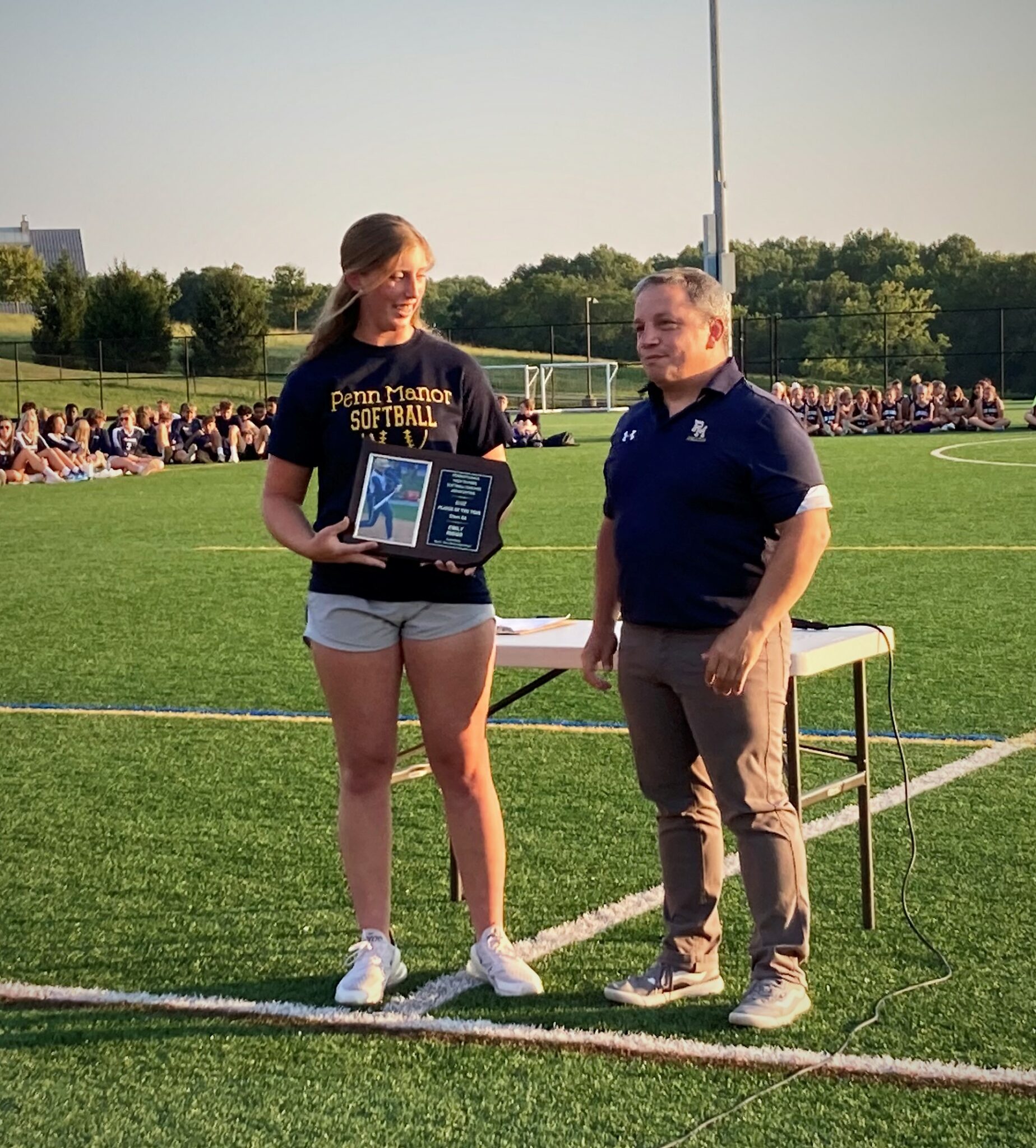 Photo of Kickoff Classic award presentation to Emily Riggs