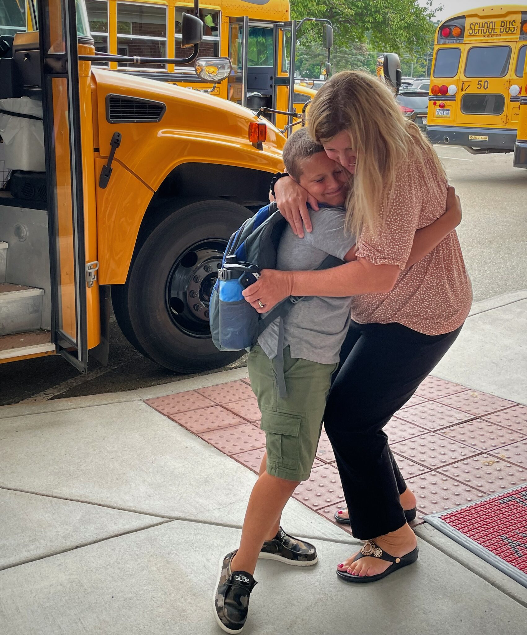 Photo of Martic principal Jen Sugra embracing a student