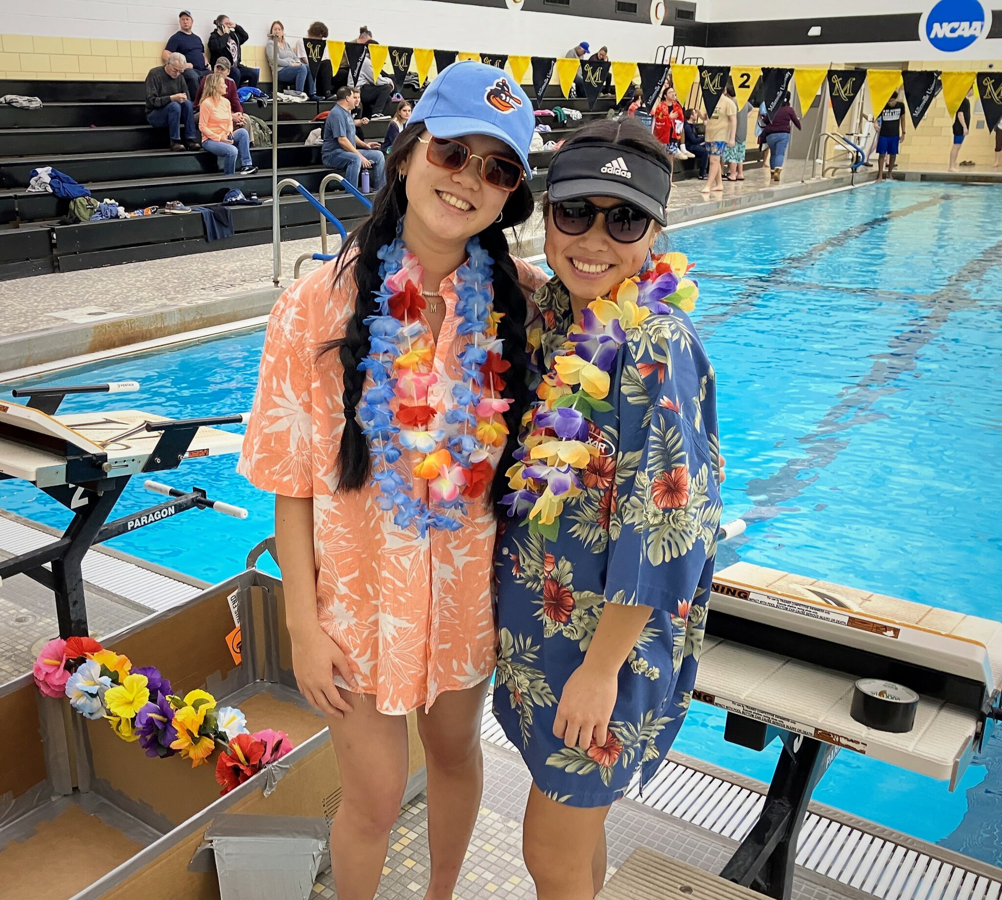 Photo of two competitors with their boat