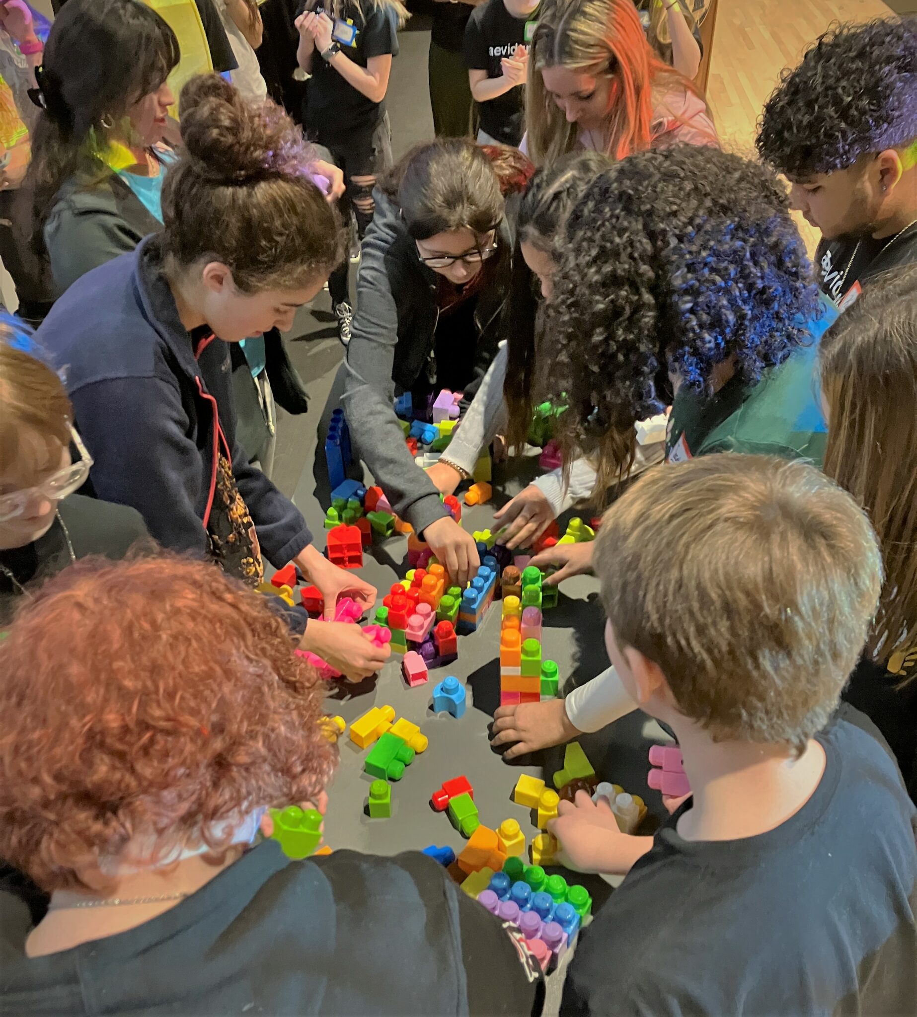 Photo of students working on group Lego building activity