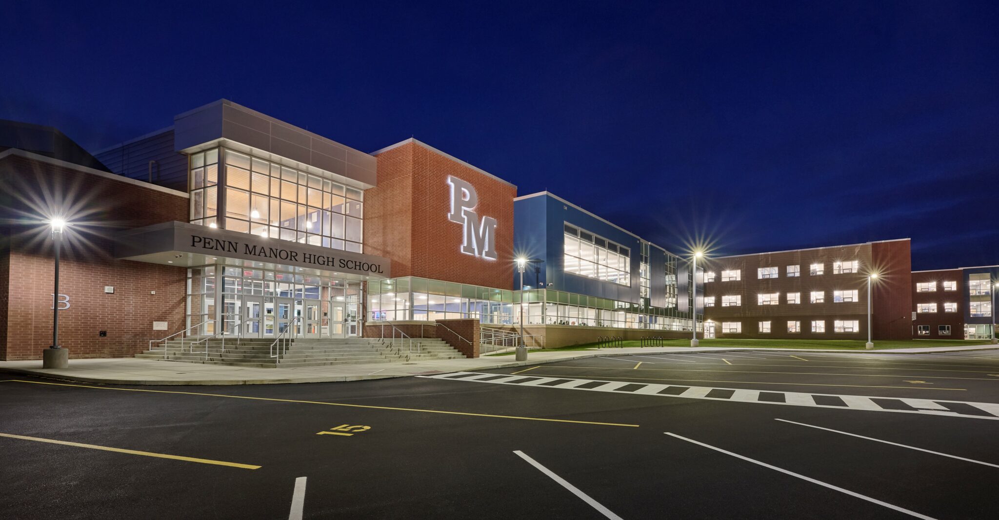 Photo of Penn Manor High School exterior at night