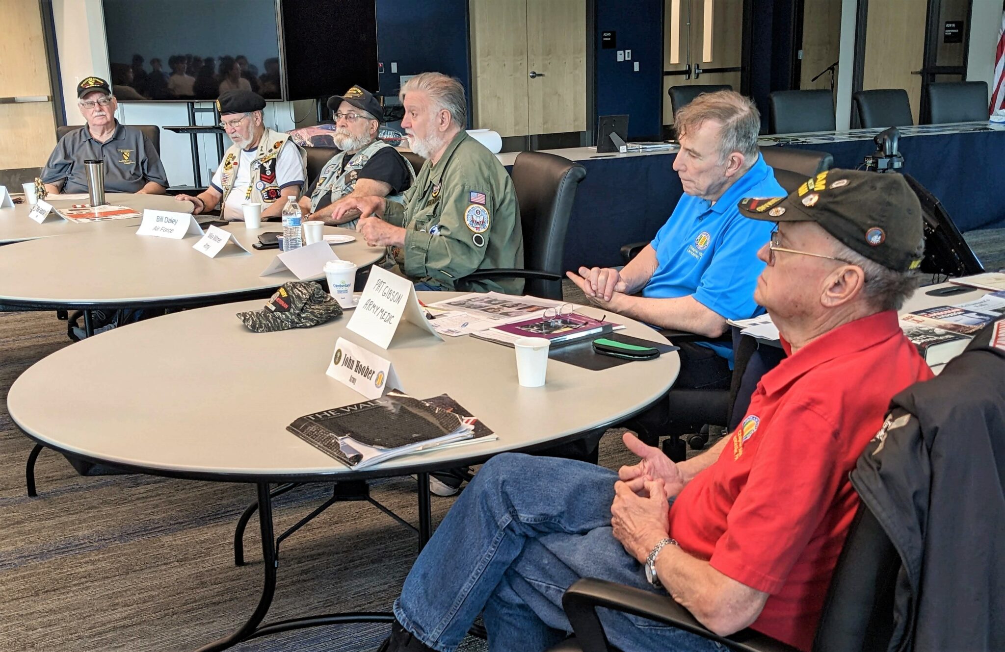 The panel of six veterans.