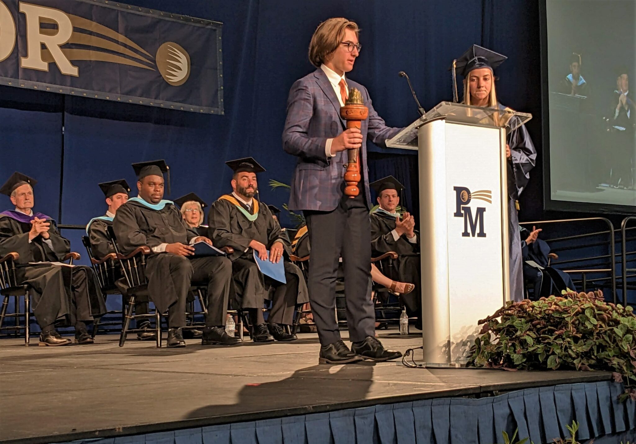 Photo of two speakers onstage