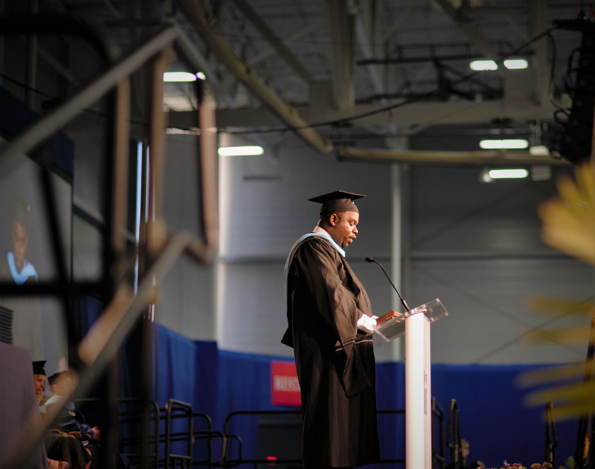 Photo of principal Baron Jones onstage