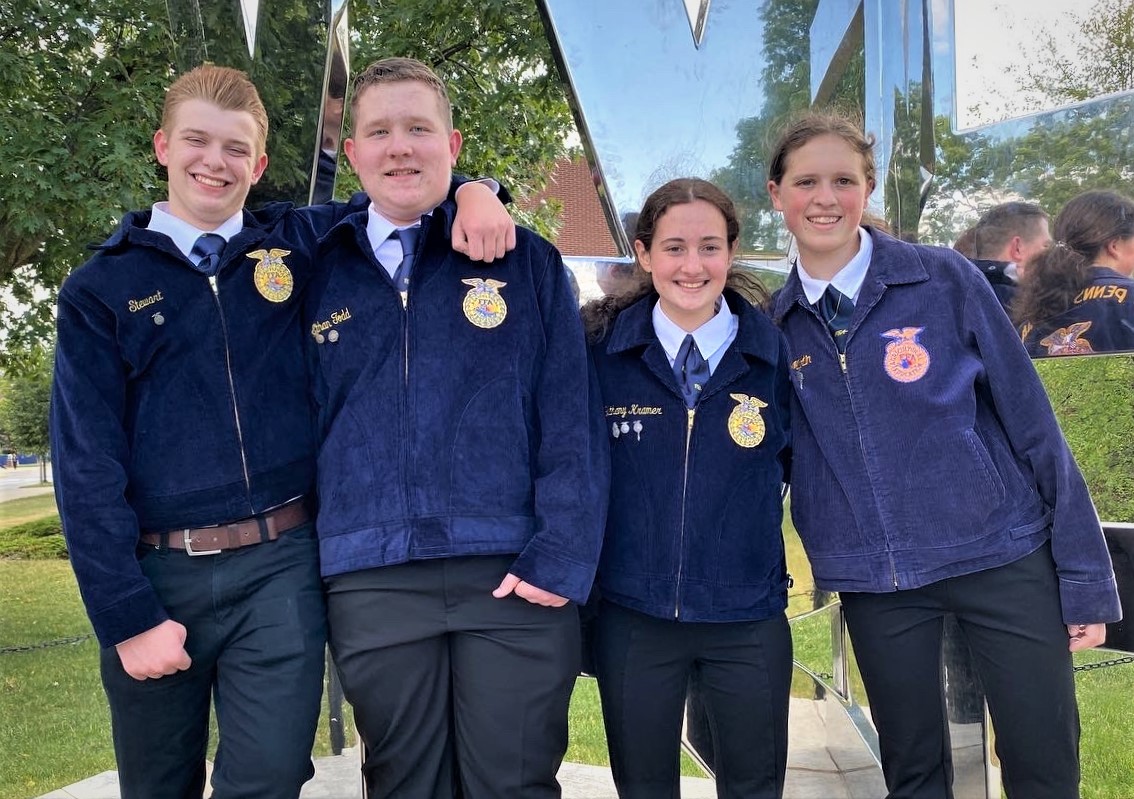 Photo of four students who are on the Milk Quality Products Team.