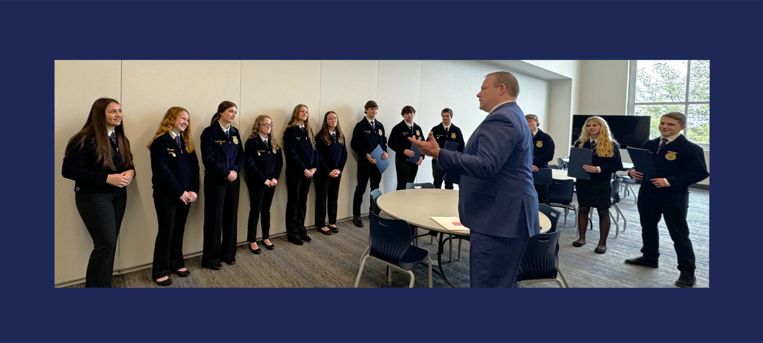 Senator Martin with 12 Manor FFA members.