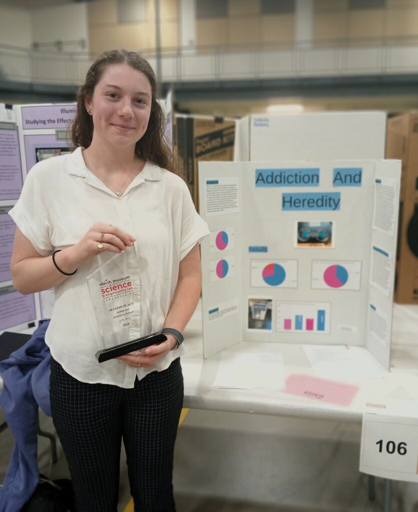 Corrine Smith stands with her project and award.