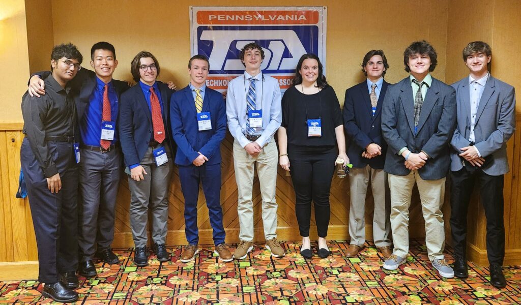 Eight TSA students and advisor.