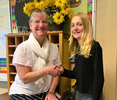 Teagan Collins and her teacher, Mindy Swope.