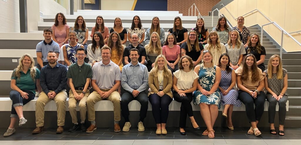 Group photo of 32 teachers.