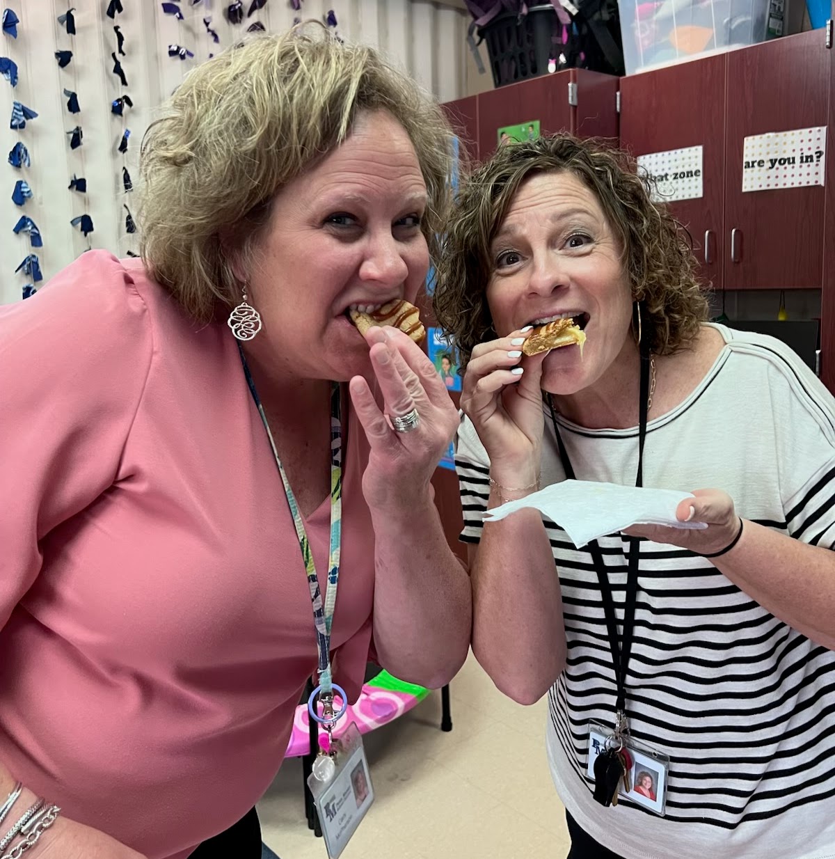The principal and assistant principal eat cookies