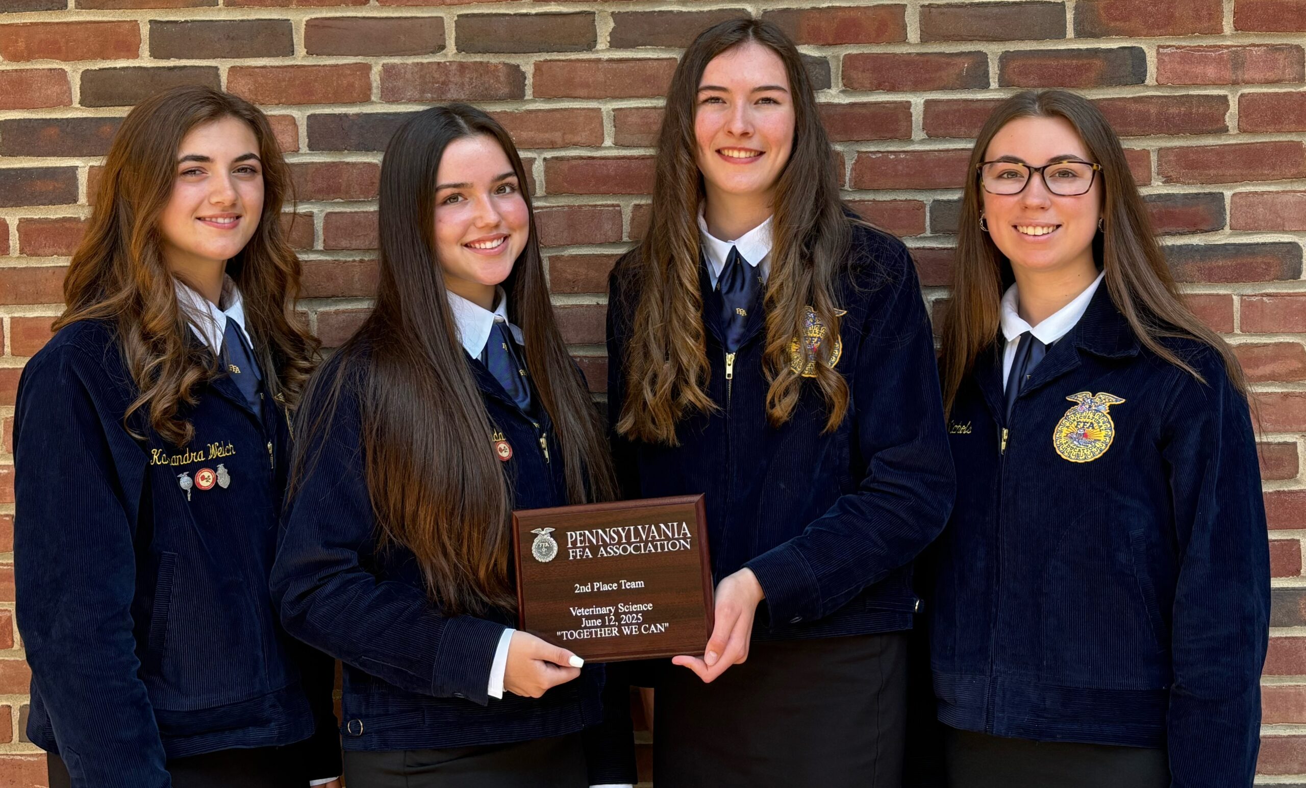 Four veterinary science team members.